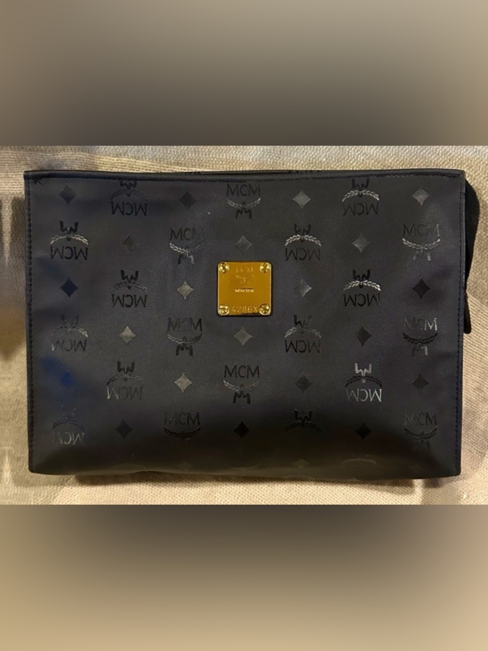 EUC - MCM Black Logo Monogram Pouch with Gold Plaque